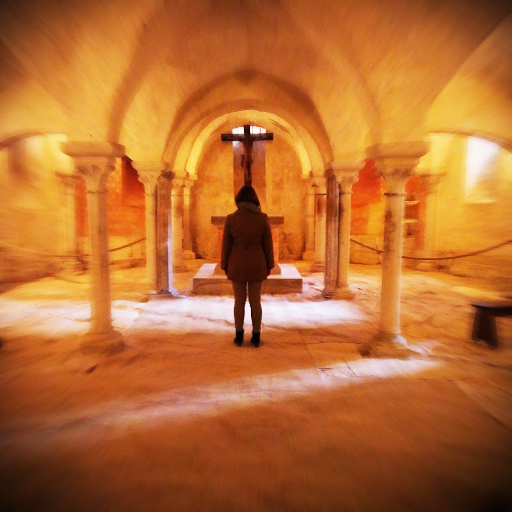 Image- Me on pilgrimage in the Crypt of Abbaye Sainte-Marie-Madeleine de Vézelay where relics of Saint Mary Magdalene are housed.